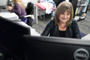 Patti working on a client account